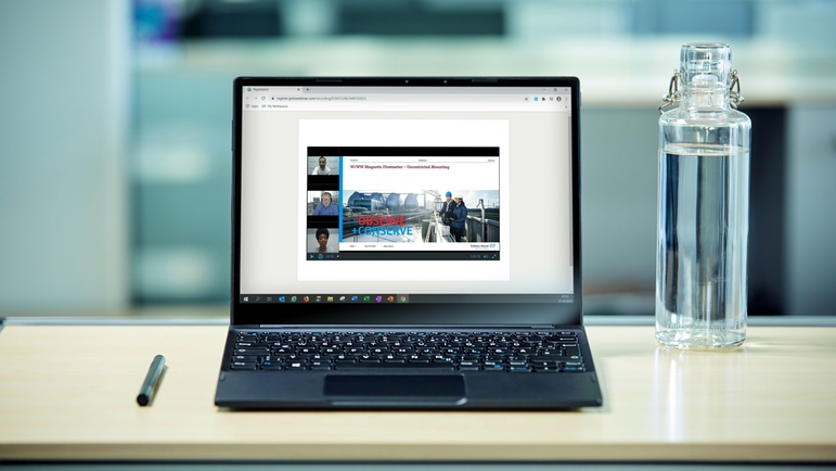 Computador com uma apresentação de um seminário online da Endress+Hauser