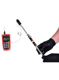 Temperature sensor plugged into a calibration accessory in a multi optic kit for Raman spectroscopy